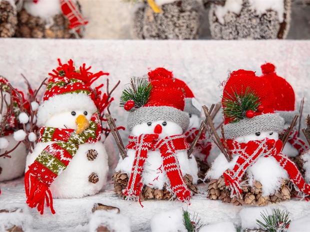 Festive Fund promotional image - three snowmen in a row wearing red santa hats