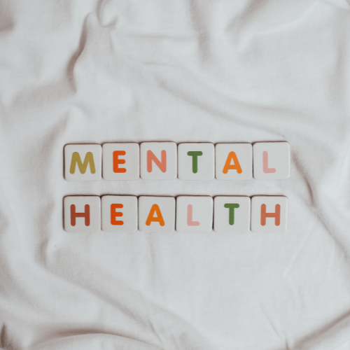 Image showing the words 'Mental Health' spelled out using colourful letter tiles.